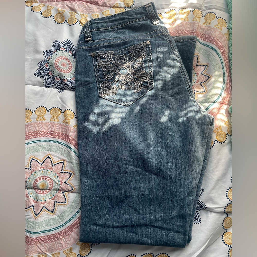 Nine West jeans from 2010s. mid rise fit and they are boot cut.